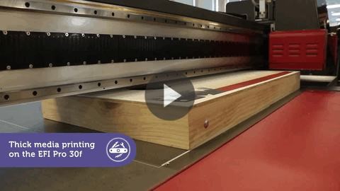 This is a printer image of the EFI Pro 30f which showcases thick media printing application