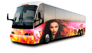 Colorful tour bus with a striking graphic of a woman's face surrounded by flames and dancers on a vibrant pink and orange background. Dynamic and bold design.